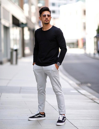 Black Long Sleeve T-Shirt · Grey Chinos · Black and White Canvas Low Top Sneakers · Silver Watch · Brown Beaded Bracelet