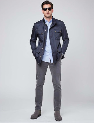 Navy Field Jacket · Light Blue Long Sleeve Shirt · Charcoal Jeans · Grey Suede Chelsea Boots · Black Sunglasses · Silver Watch