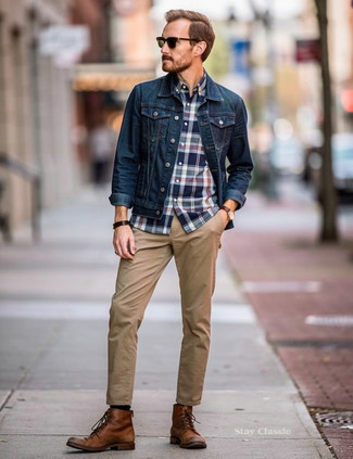 Blue Denim Jacket · White and Red and Navy Plaid Short Sleeve Shirt · Khaki Chinos · Tobacco Leather Casual Boots · Black Sunglasses · Dark Brown Leather Watch