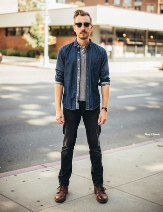 Navy Denim Shirt · Grey Henley Shirt · Charcoal Jeans · Brown Leather Casual Boots · Dark Brown Sunglasses · Dark Brown Leather Watch