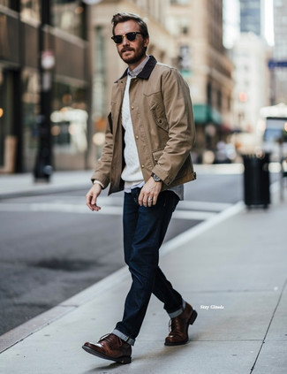 Tan Barn Jacket · White Cable Sweater · Grey Short Sleeve Shirt · Navy Jeans · Brown Leather Casual Boots · Black Sunglasses