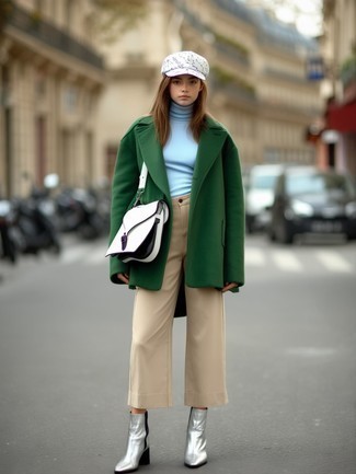 Green Coat · Light Blue Turtleneck · Beige Wide Leg Pants · Silver Leather Ankle Boots · White and Black Leather Satchel Bag · White Print Cap