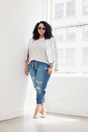 White Leather Biker Jacket · Beige Crew-neck T-shirt · Blue Ripped Jeans · White Leather Heeled Sandals · Black and White Sunglasses · Silver Watch