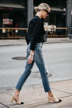 Black Eyelet Long Sleeve Blouse · Blue Jeans · Black and Tan Leather Pumps · Black Sunglasses · Gold Watch · Gold Earrings
