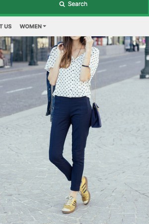 Blue Denim Jacket · White and Black Polka Dot Short Sleeve Blouse · Navy Skinny Pants · Gold Leather Low Top Sneakers · Navy Leather Crossbody Bag · Black Sunglasses