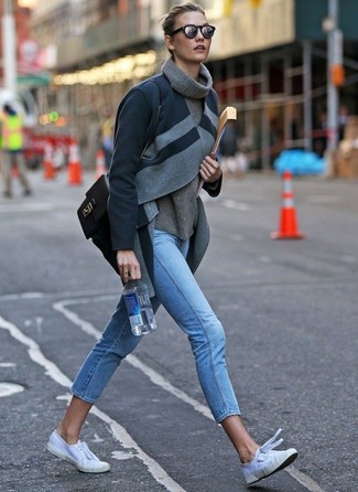 Charcoal Coat · Grey Wool Turtleneck · Light Blue Skinny Jeans · White Canvas Low Top Sneakers · Black Leather Satchel Bag · Silver Sunglasses
