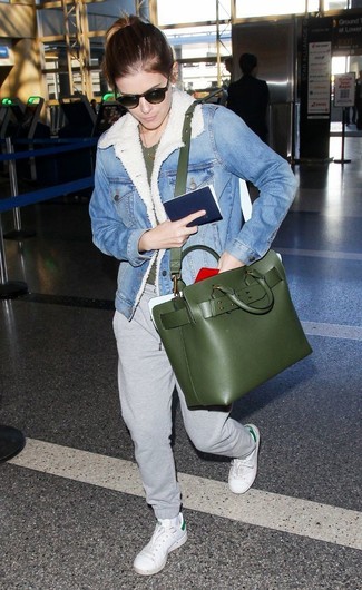 Light Blue Denim Shearling Jacket · Dark Green Crew-neck T-shirt · Grey Sweatpants · White Leather Low Top Sneakers · Dark Green Leather Tote Bag · Dark Brown Sunglasses