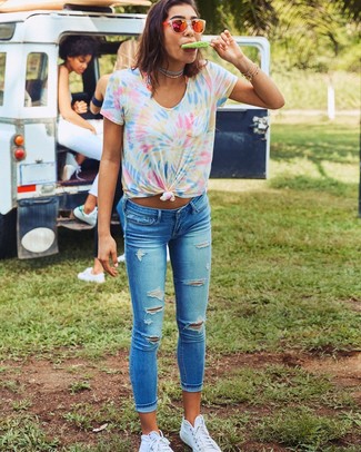 Multi colored Tie-Dye Crew-neck T-shirt · Blue Ripped Skinny Jeans · White Canvas High Top Sneakers · Orange Sunglasses · Silver Choker · Gold Bracelet