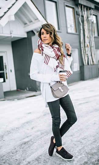 White Oversized Sweater · Black Leather Skinny Jeans · Black Athletic Shoes · Grey Leather Crossbody Bag · White Plaid Scarf · Black Leather Watch