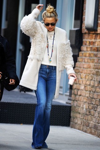 White Fleece Coat · White Crew-neck Sweater · Blue Flare Jeans · Black Suede Ankle Boots · Black Sunglasses · Black Beaded Pendant