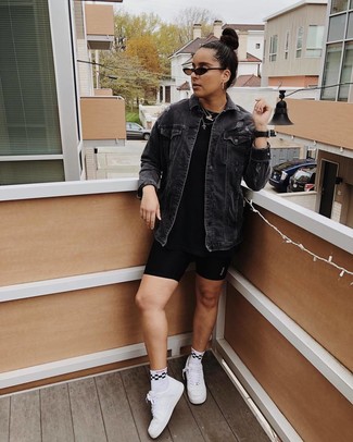 Black Denim Jacket · Black Crew-neck T-shirt · Black Bike Shorts · White Leather Low Top Sneakers · White and Black Print Socks · Black Sunglasses