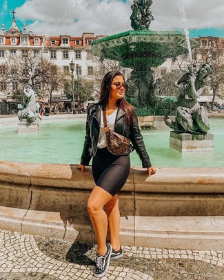 Black Leather Biker Jacket · White V-neck T-shirt · Black Bike Shorts · Black and White Canvas Low Top Sneakers · Brown Leather Fanny Pack · Brown Sunglasses