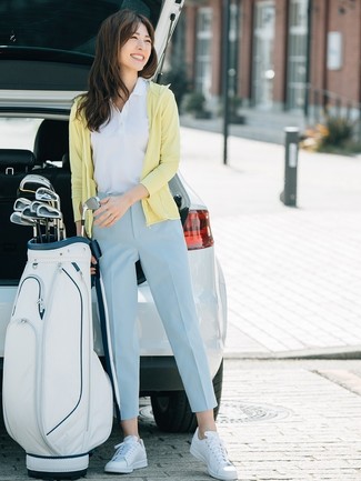 Yellow Hoodie · White Polo · Light Blue Tapered Pants · White Leather Low Top Sneakers