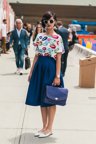 White Print Short Sleeve Blouse · Navy Full Skirt · White Leather Ballerina Shoes · Blue Leather Satchel Bag · Black and White Sunglasses · Silver Watch