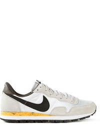 White and Black Athletic Shoes
